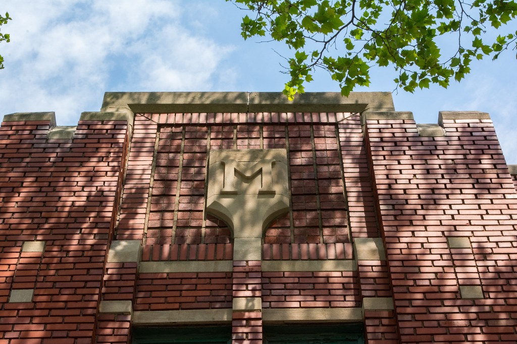 shield over front door - Mueller Electric Company Building